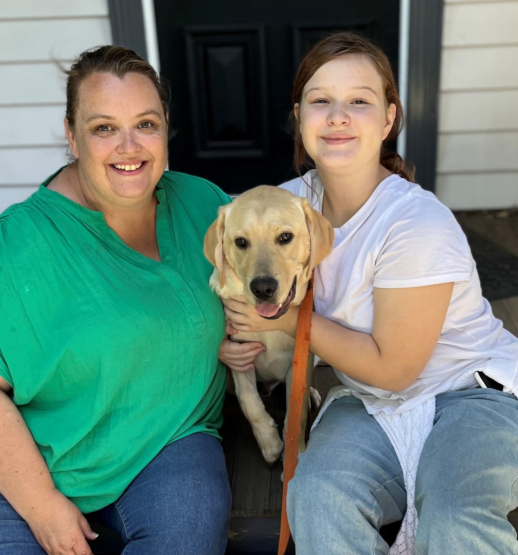 "Puppy carer Sally and her daughter with Seeing Eye Dog Sergo"